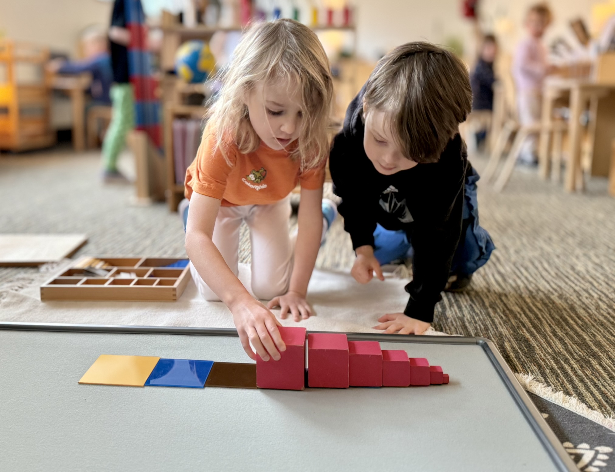 Child engaged in Montessori activity at Girasol Montessori School